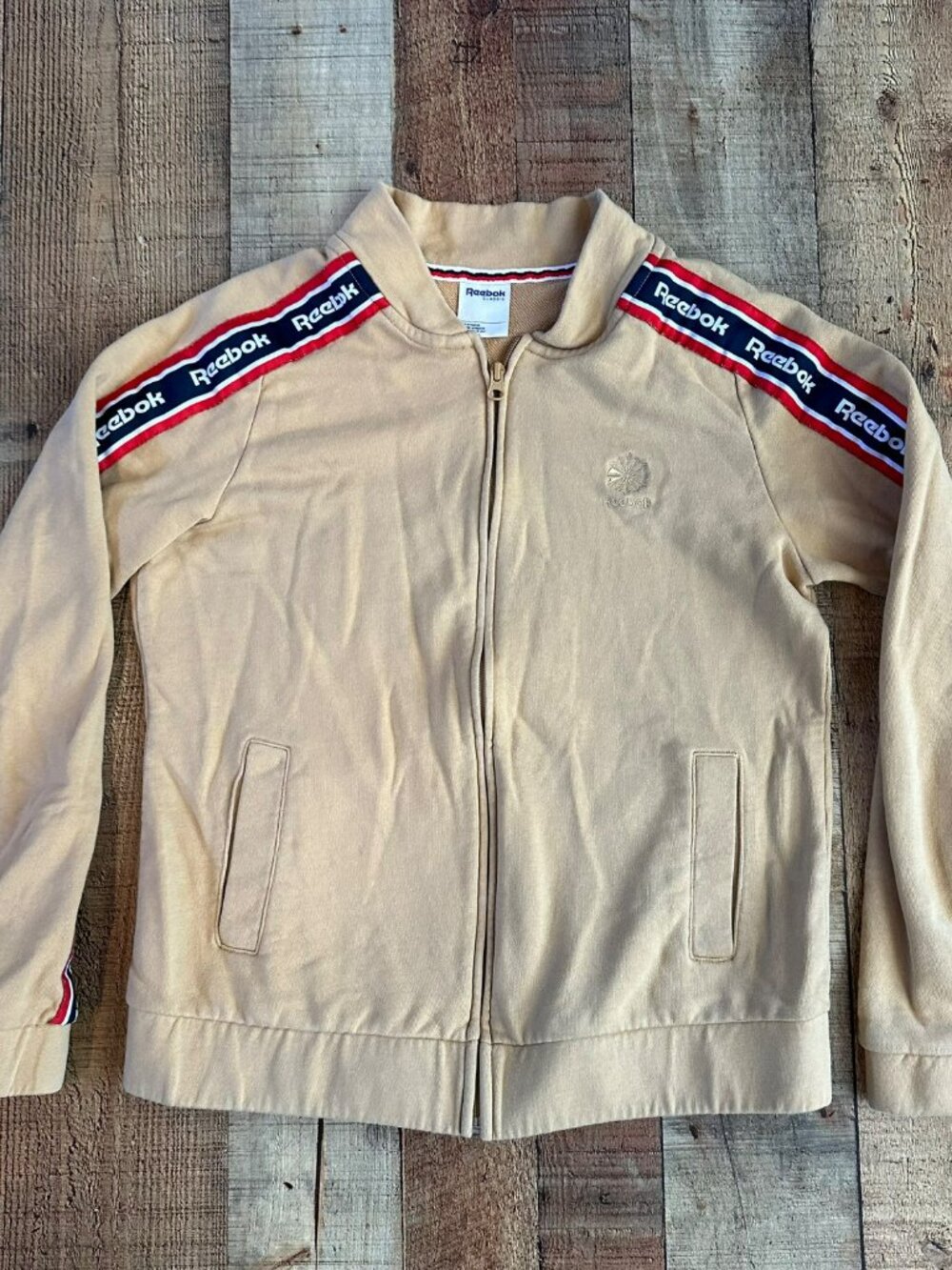 Reebok Y2K tan track jacket with red and black stripe women's size medium